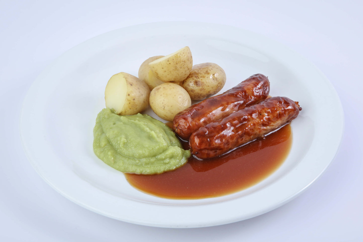 Sausage Dinner with Mash Potatoes, Gravy & Mushy Peas