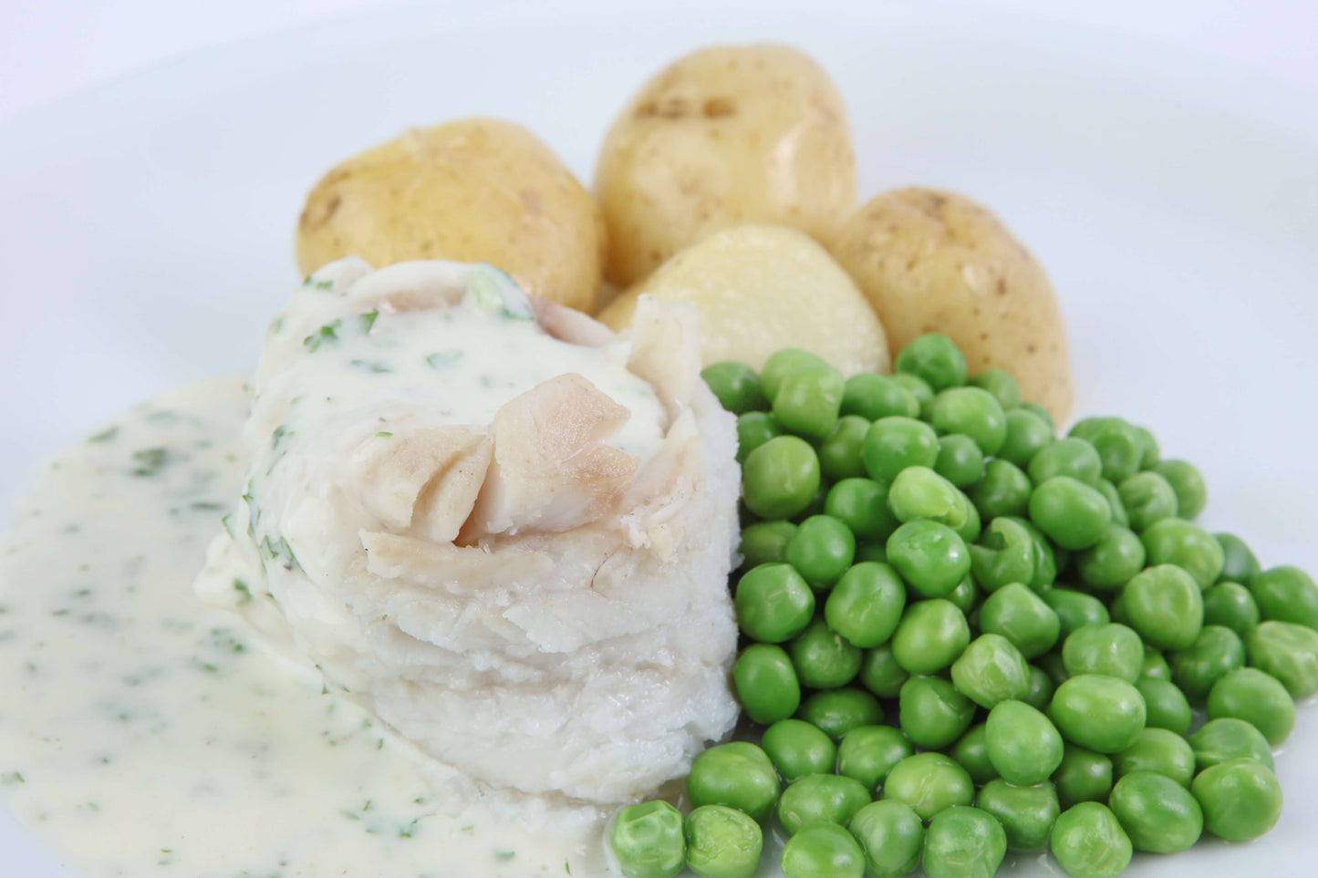 Steamed Hake with New Potatoes, Peas & Dill Sauce